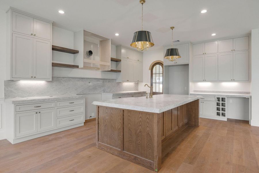 Rich wood tones and timeless detailing create a space that feels warm and refined. Rich wood tones and timeless detailing create a space that feels warm and refined.