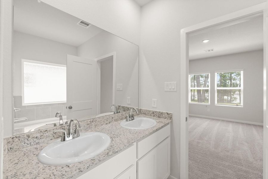 Furnished interior view inside a new home in Lakes at Crockett Martin, Conroe (Image 6).