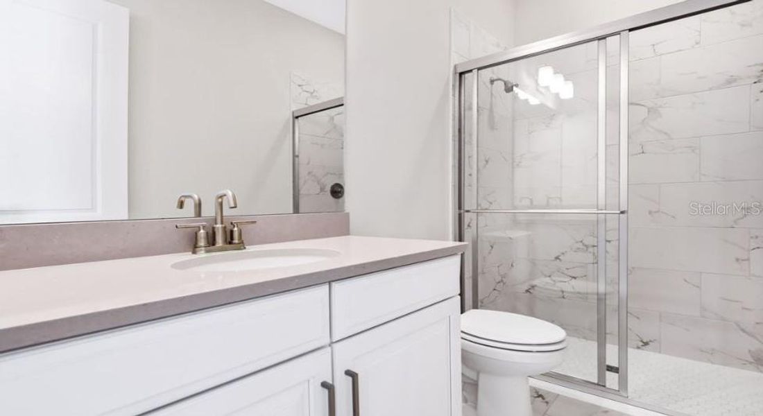 Furnished interior view inside a new home in Esplanade at Starling, Punta Gorda (Image 11). Furnished interior view inside a new home in Esplanade at Starling, Punta Gorda (Image 11).