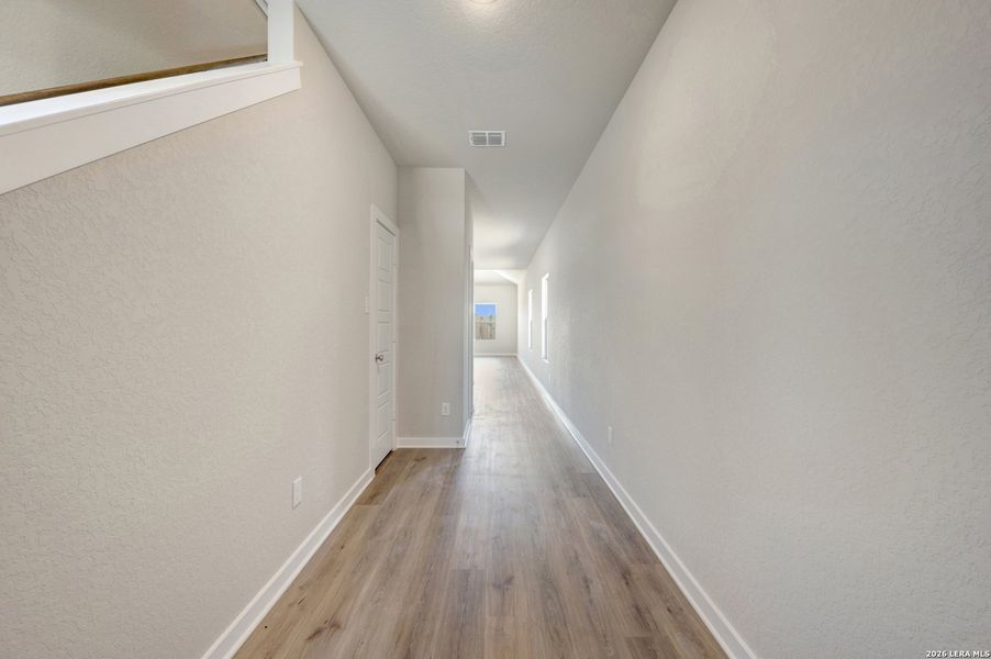 Spacious, unfurnished interior of a new home in Winding Brook, San Antonio (Image 45).