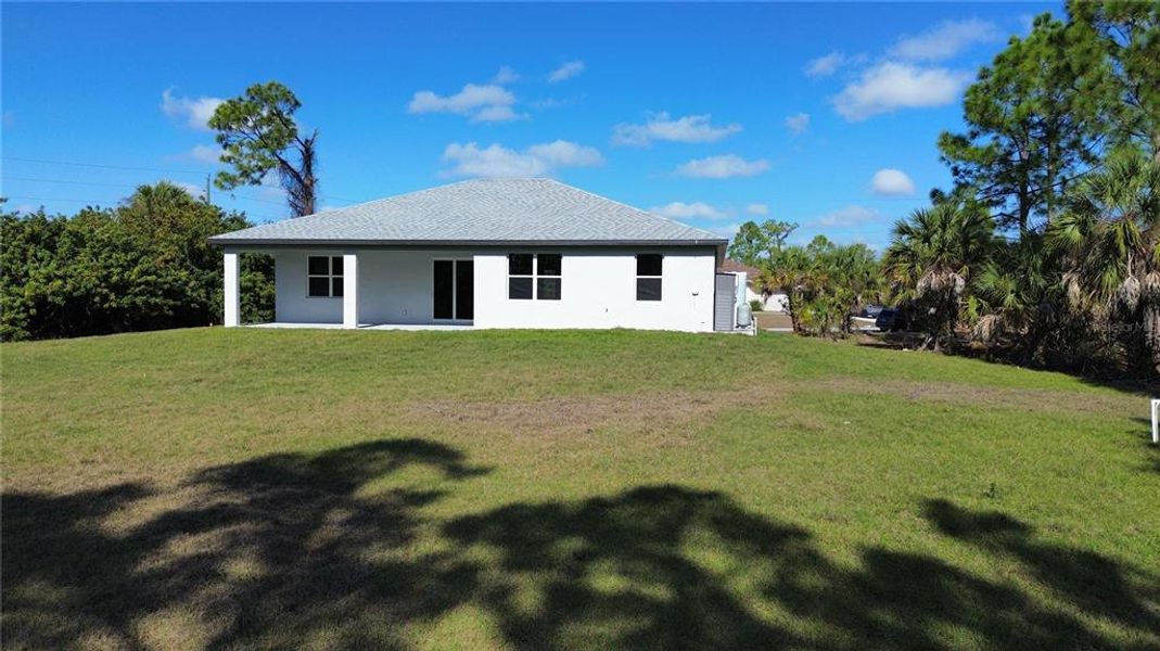 Exterior details and patio area of a home in , North Port (Image 4).