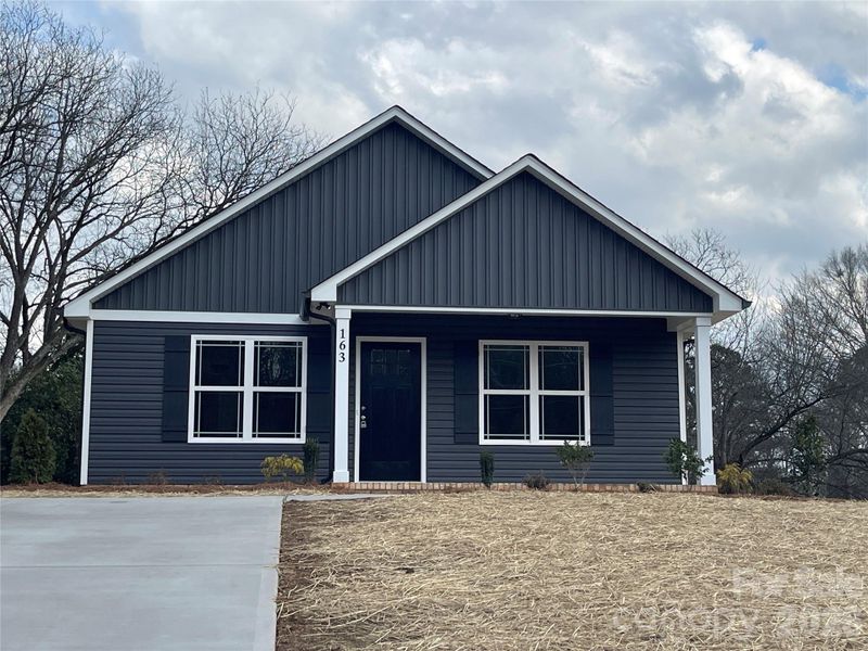 Front exterior of a new home in , Norwood, NC, highlighting curb appeal (Image 19).