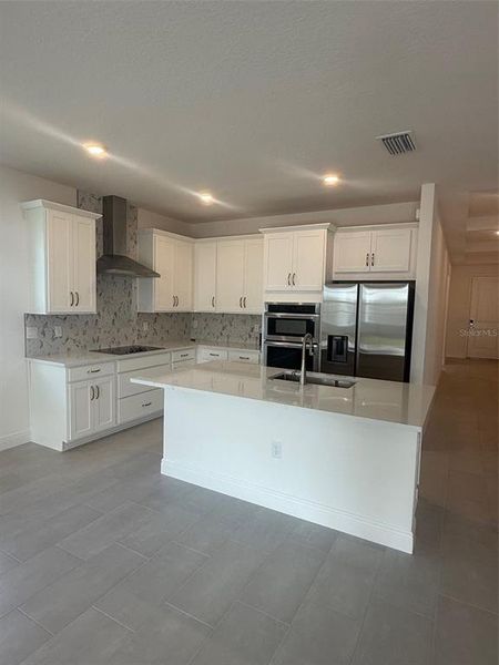 Furnished interior view inside a new home in , St. Cloud (Image 2).