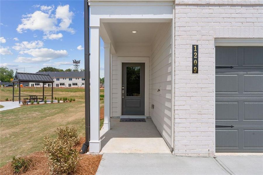 Exterior details and patio area of a home in Magnolia Square, Austell (Image 3). Exterior details and patio area of a home in Magnolia Square, Austell (Image 3).