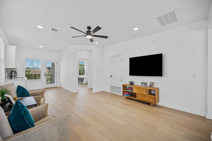 Owners retreat second living area and wet bar open to balcony.