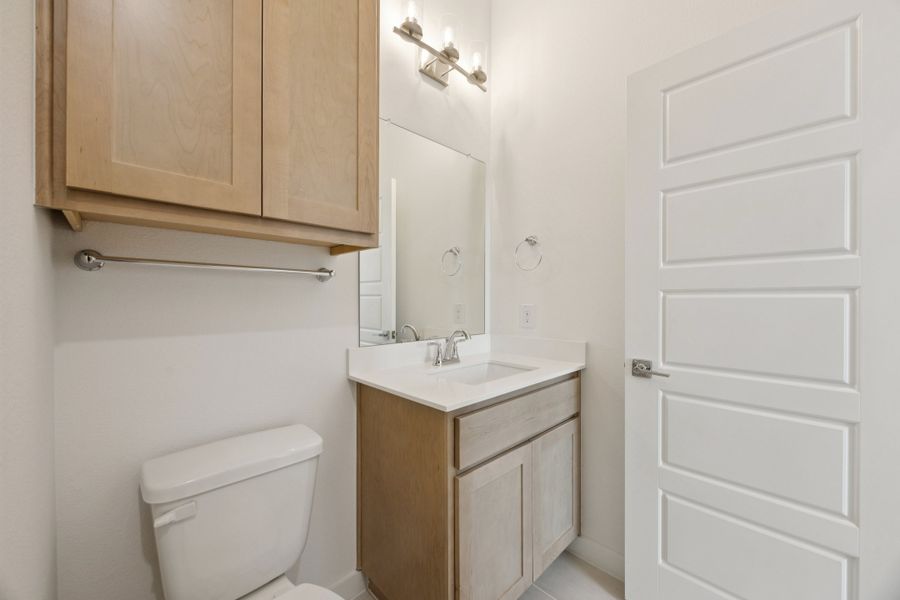 Bathroom in the Monet II home plan by Trophy Signature Homes – REPRESENTATIVE PHOTO