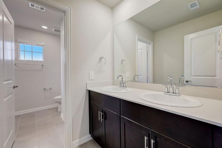 Photo is not of the actual home, but is an inspirational photo of builder’s model home and may depict options, furnishings, and/or decorator features that are not included.