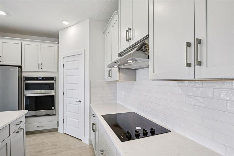 Furnished interior in a model home at Magnolia Bay - Reserve Series in Nokomis (Image 21).