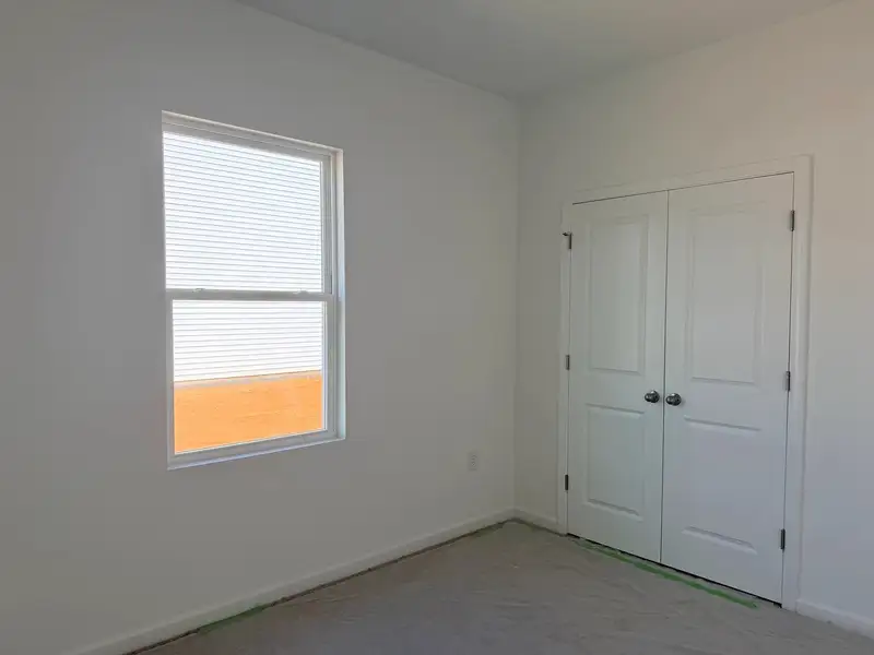 Spacious, unfurnished interior of a new home in Middleton Farms, Middlesex (Image 11).