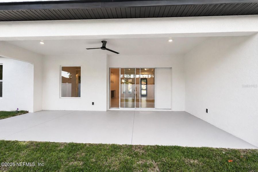 Exterior details and patio area of a home in , Palm Coast (Image 2). Exterior details and patio area of a home in , Palm Coast (Image 2).
