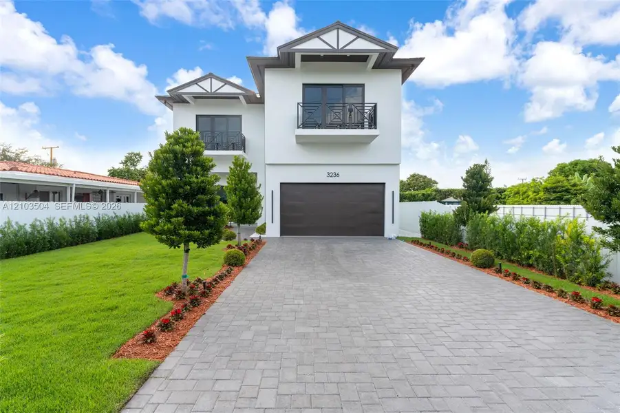 Front exterior of a new home in , Miami, FL, highlighting curb appeal (Image 27).