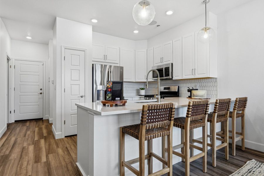 Representative furnished interior of a home built from the Discovery by Taylor Morrison in Trailstone, Arvada (Image 6).