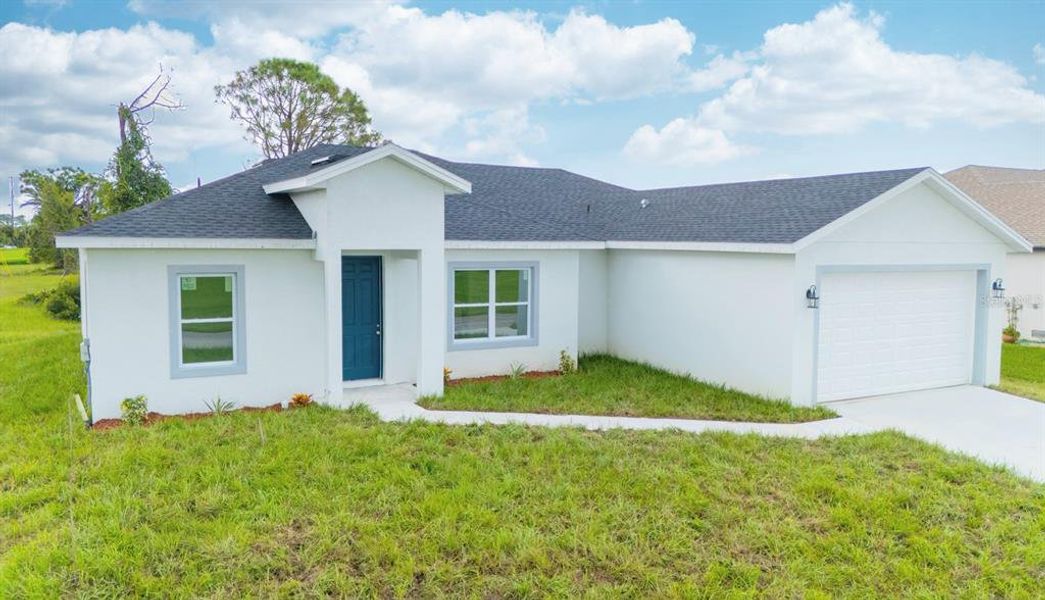 Front exterior of a new home in , Placida, FL, highlighting curb appeal (Image 29). Front exterior of a new home in , Placida, FL, highlighting curb appeal (Image 29).