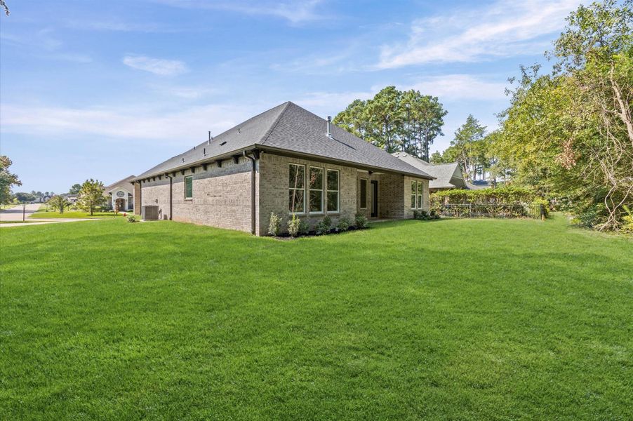 Front exterior of a new home in , Montgomery, TX, highlighting curb appeal (Image 23). Front exterior of a new home in , Montgomery, TX, highlighting curb appeal (Image 23).