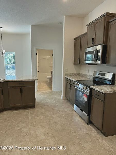 Furnished interior view inside a new home in Spring Hill, Spring Hill (Image 2). Furnished interior view inside a new home in Spring Hill, Spring Hill (Image 2).