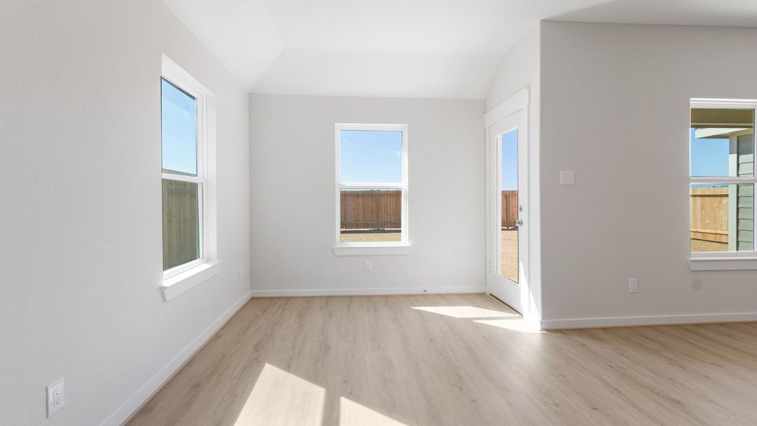 Representative furnished interior of a home built from the Blanton by Brightland Homes in Sunterra, Katy (Image 9).