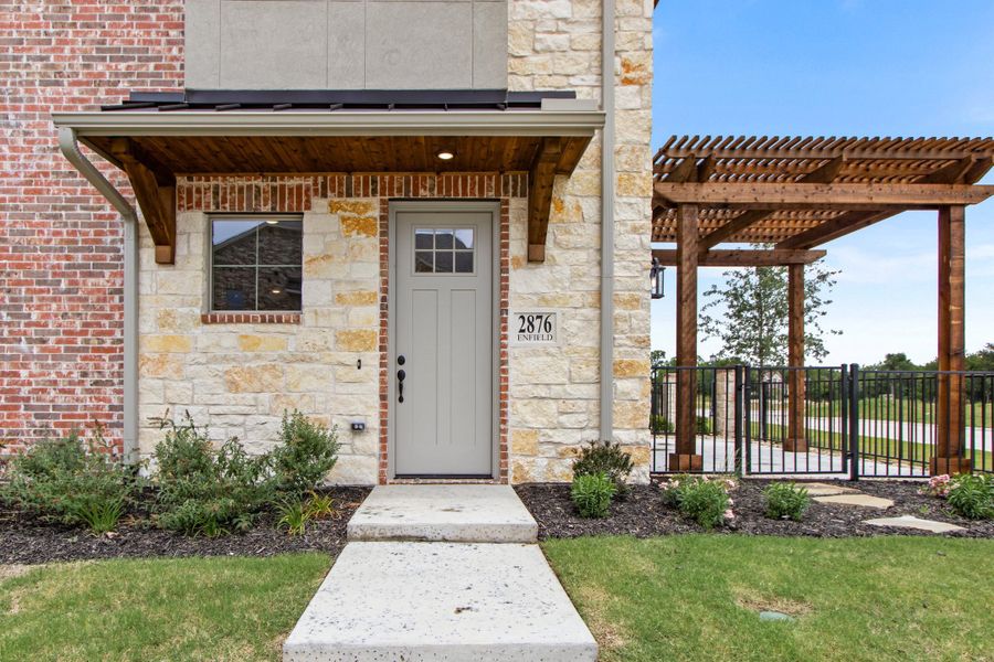 Exterior details and patio area of a home in The Tribute, The Colony (Image 28). Exterior details and patio area of a home in The Tribute, The Colony (Image 28).