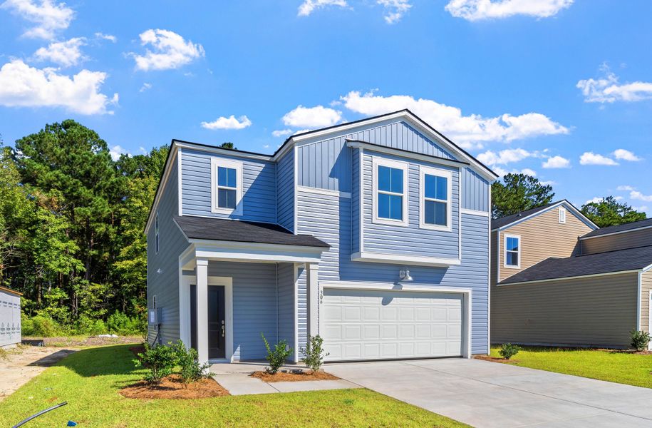 Front exterior of a new home in Cypress Preserve, Moncks Corner, SC, highlighting curb appeal (Image 2). Front exterior of a new home in Cypress Preserve, Moncks Corner, SC, highlighting curb appeal (Image 2).