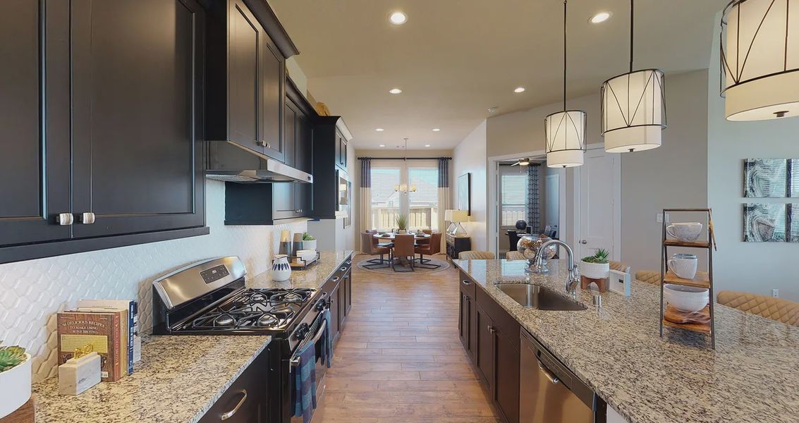 Representative furnished interior of a home built from the Hillcrest by Chesmar Homes in Sienna Chateau, Missouri City (Image 4).