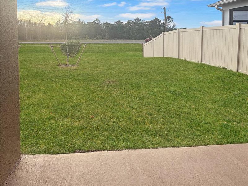 Exterior details and patio area of a home in Harmony Central, St. Cloud (Image 3).