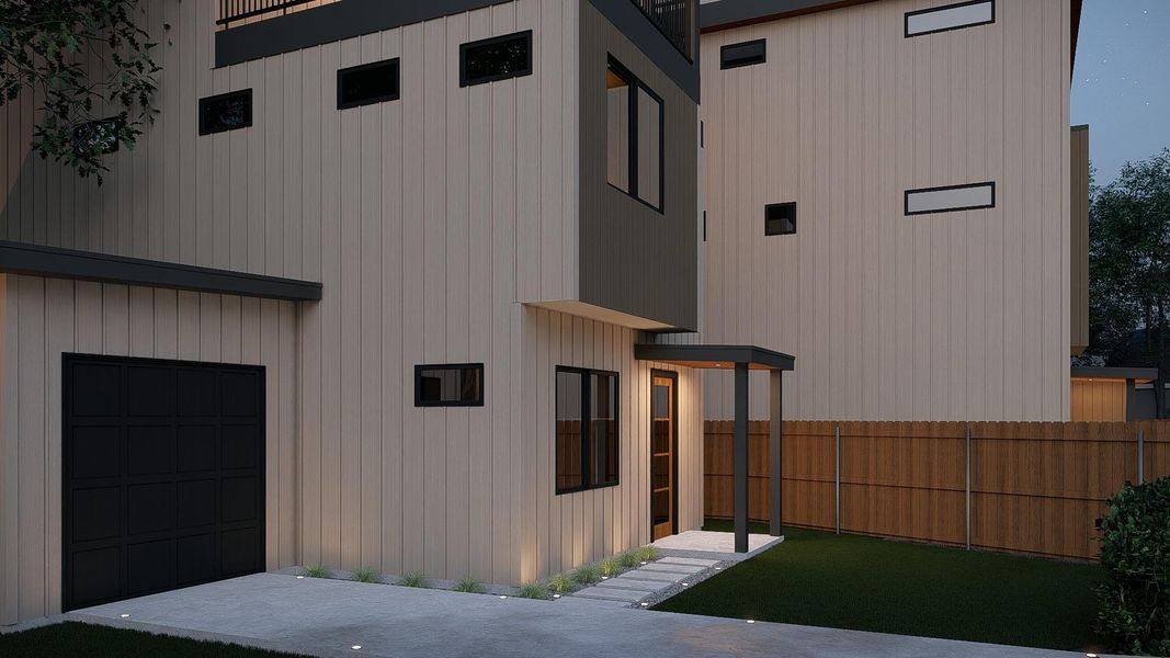 View of side of home featuring board and batten siding and a garage