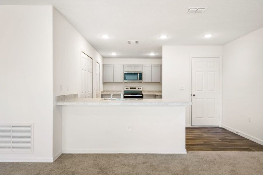 Furnished interior view inside a new home in Cape Coral, Cape Coral (Image 3). Furnished interior view inside a new home in Cape Coral, Cape Coral (Image 3).