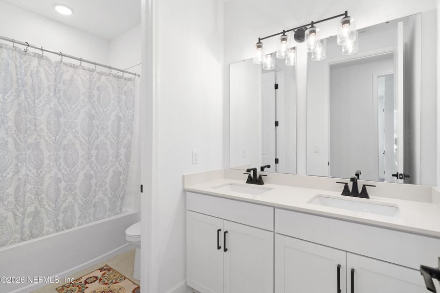 Furnished interior view inside a new home in TrailMark, St. Augustine (Image 5).