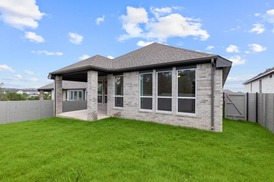 Rear of Home and Private Backyard