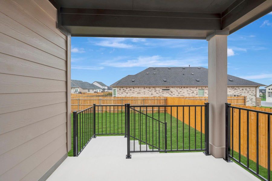 Exterior details and patio area of a home in Cascades at Onion Creek, Austin (Image 12).