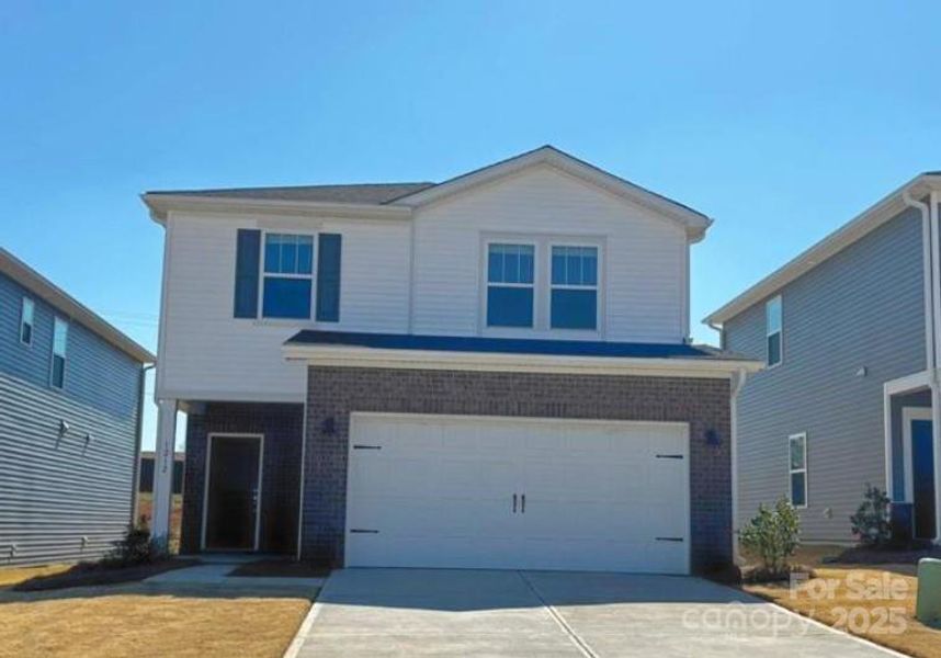 Front exterior of a new home in Walnut Reserve, Conover, NC, highlighting curb appeal (Image 1). Front exterior of a new home in Walnut Reserve, Conover, NC, highlighting curb appeal (Image 1).