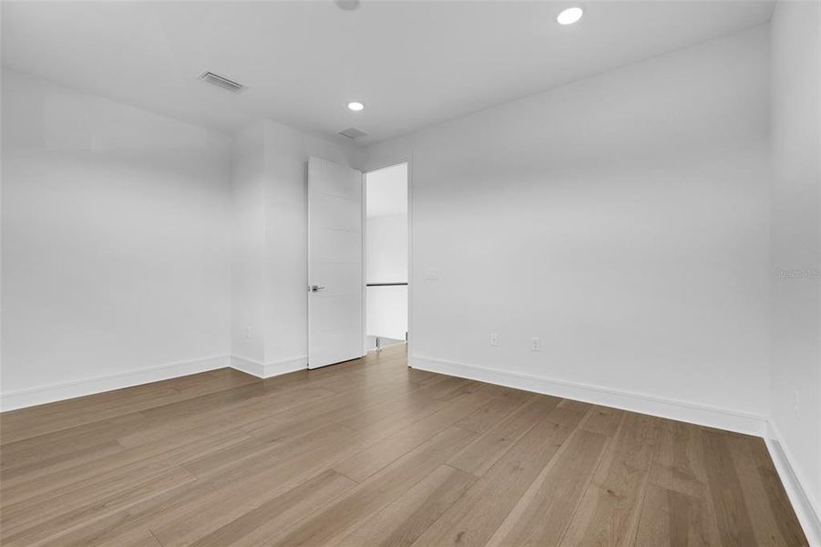 Spacious, unfurnished interior of a new home in Hampton Green at Providence, Davenport (Image 55).