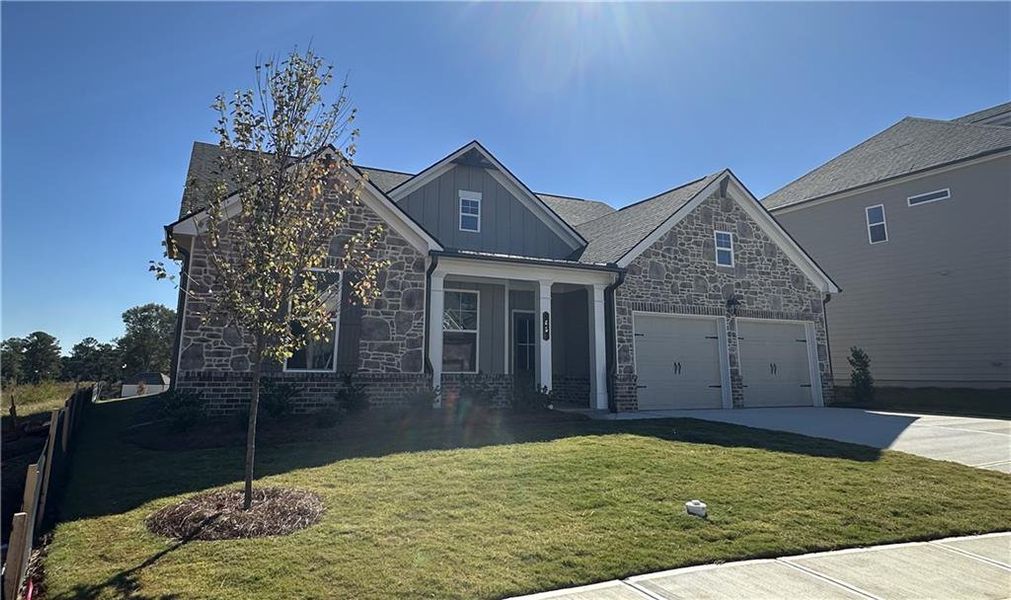 Front exterior of a new home in Summerlin, Winder, GA, highlighting curb appeal (Image 31).