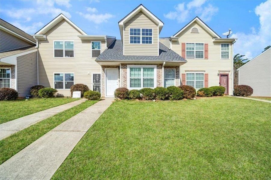 Front exterior of a new home in , Union City, GA, highlighting curb appeal (Image 2). Front exterior of a new home in , Union City, GA, highlighting curb appeal (Image 2).