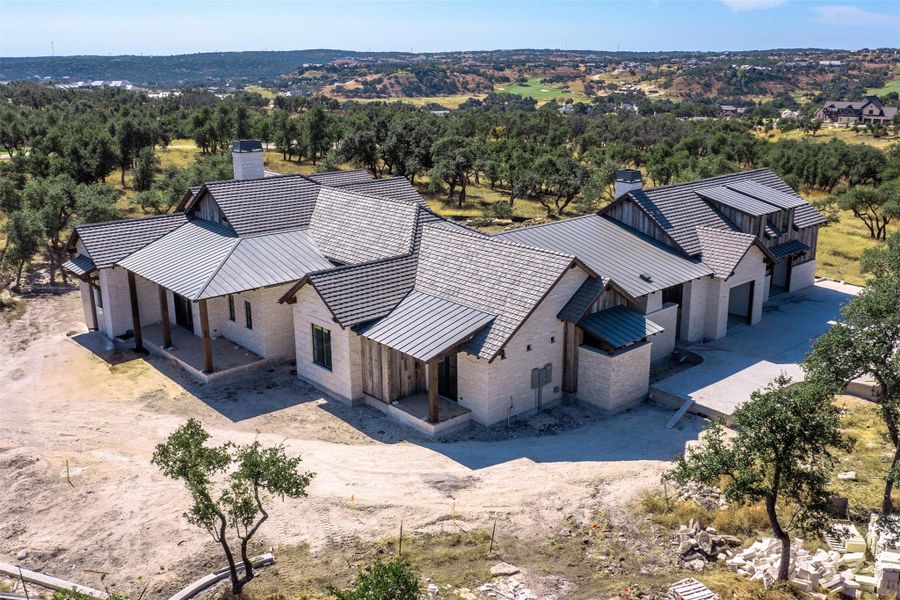 Front exterior of a new home in , Fredericksburg, TX, highlighting curb appeal (Image 2).