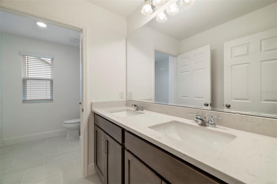 Furnished interior view inside a new home in Ridgeview, Clermont (Image 3).