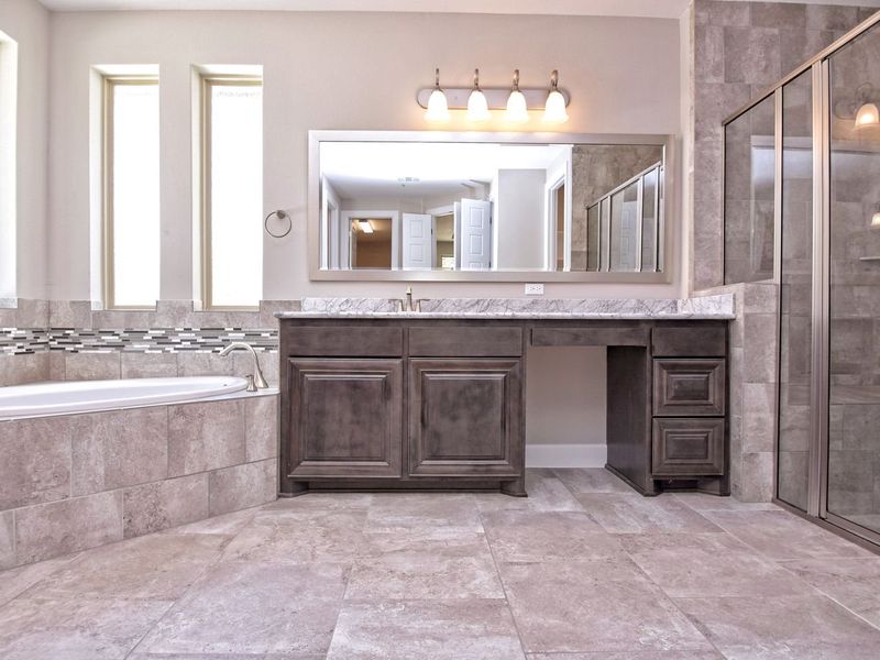 Representative furnished interior of a home built from the San Simeon I by Giddens Homes in Clearwater Ranch, Liberty Hill (Image 273).