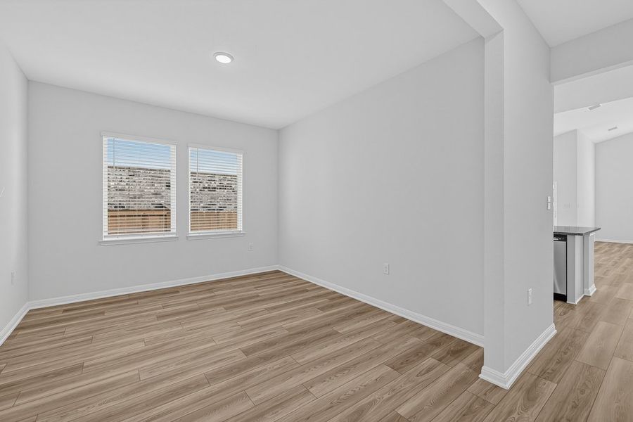 Representative unfurnished interior of a home built from the Warbler by Taylor Morrison in Longview, Del Valle (Image 11).