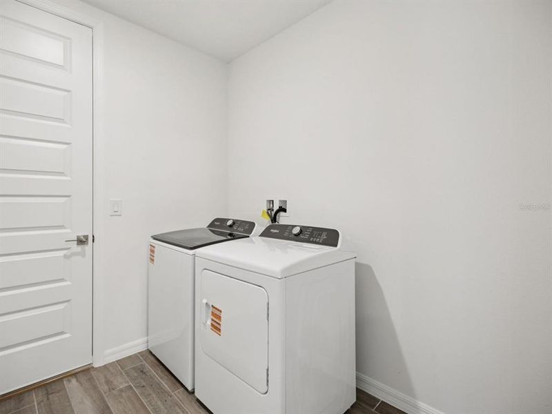 Furnished interior view inside a new home in Salt Meadows - Signature Series, Parrish (Image 8). Furnished interior view inside a new home in Salt Meadows - Signature Series, Parrish (Image 8).