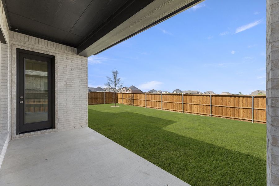 Exterior details and patio area of a home in Nelson Lake Estates, Rockwall (Image 4).