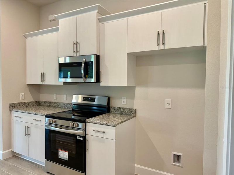 Furnished interior view inside a new home in South Gulf Cove, Port Charlotte (Image 5).