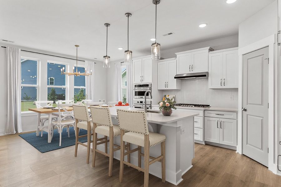 Representative furnished interior of a home built from the The Chandler by RobuckHomes in Windwater, Hampstead (Image 7).