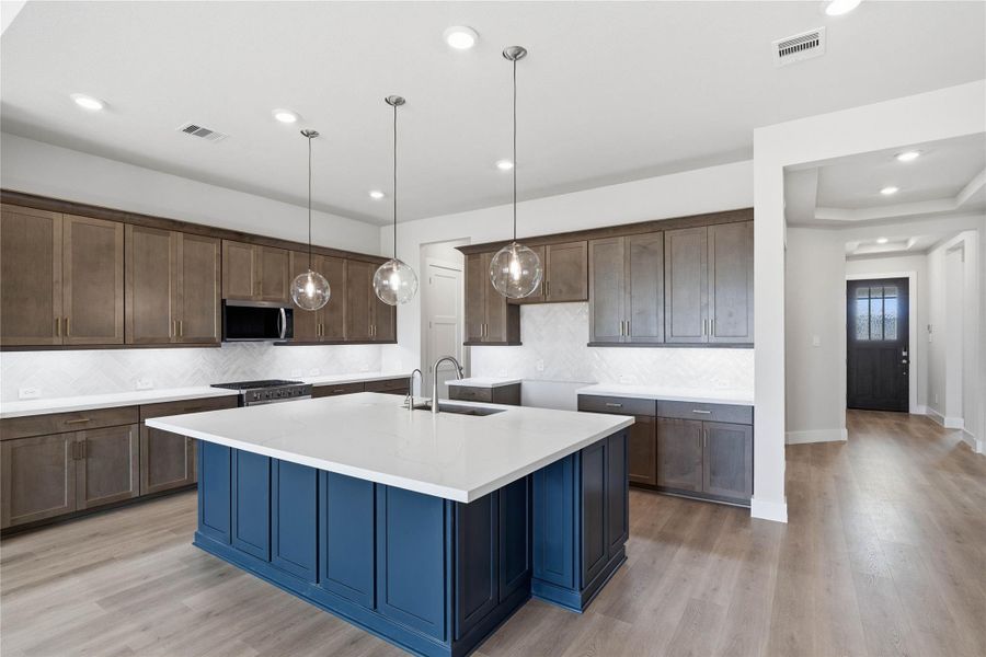 The intentional open design fosters a deep sense of connection between all three primary living zones.