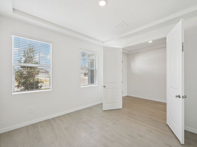 Spacious, unfurnished interior of a new home in Coasterra - Reserve Series, Palmetto (Image 13).