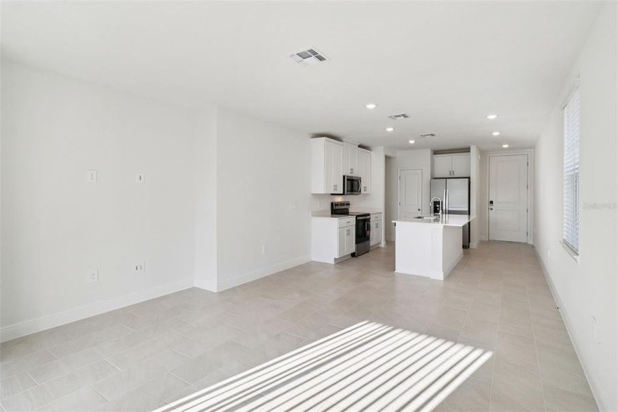 Spacious, unfurnished interior of a new home in The Reserve at Hammock Oaks - Classic Series, Lady Lake (Image 14). Spacious, unfurnished interior of a new home in The Reserve at Hammock Oaks - Classic Series, Lady Lake (Image 14).