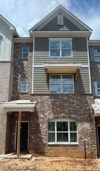 In-progress construction of a new home in Townes at South Main, Kennesaw, GA (Image 29).