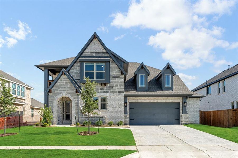 Front exterior of a new home in Maplewood, Glenn Heights, TX, highlighting curb appeal (Image 2). Front exterior of a new home in Maplewood, Glenn Heights, TX, highlighting curb appeal (Image 2).