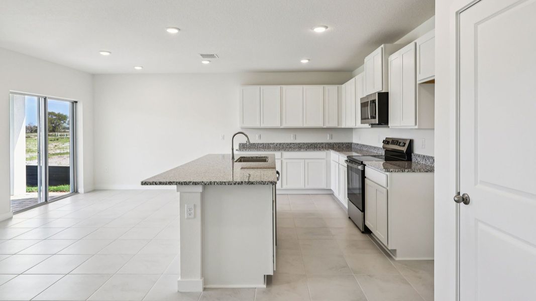 Representative furnished interior of a home built from the Baker by DRB Homes in Liberty Trace, Haines City (Image 7).
