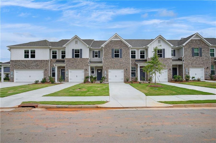 Front exterior of a new home in Avery Landing, McDonough, GA, highlighting curb appeal (Image 18).