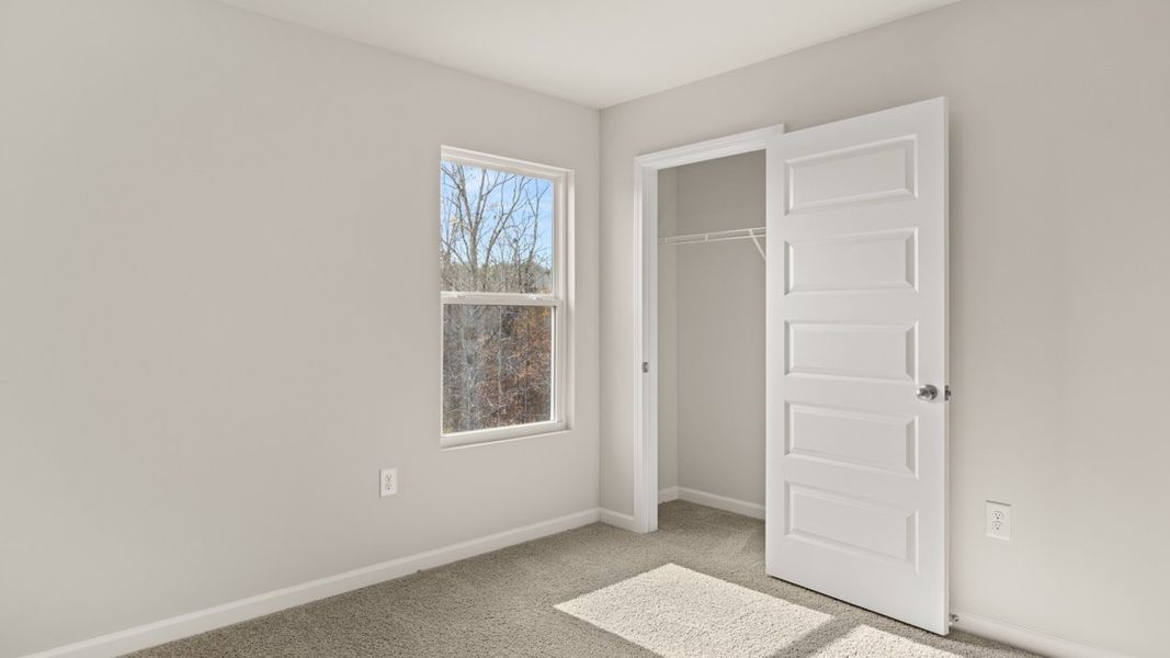 Spacious, unfurnished interior of a new home in The Reserve at Calcutta, Stockbridge (Image 25).