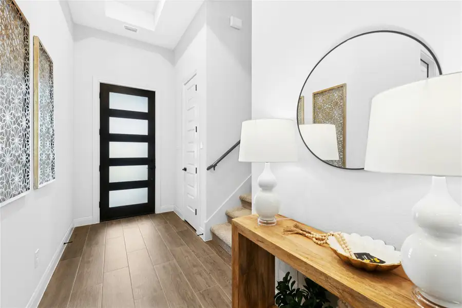 Entrance foyer featuring wood finished floors Entrance foyer featuring wood finished floors